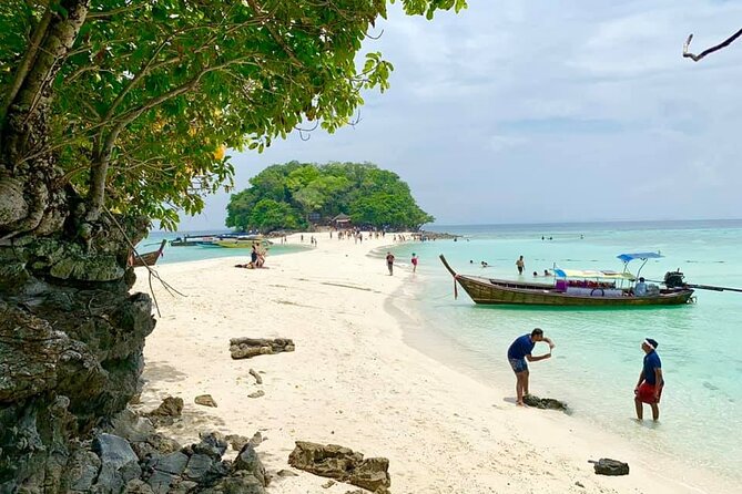 Best of Krabi 7 Islands Sunset Tour Speedboat/Long Tail Boat - Phra Nang Cave Beach and Railay Bay: limestone-cliff scenery to start