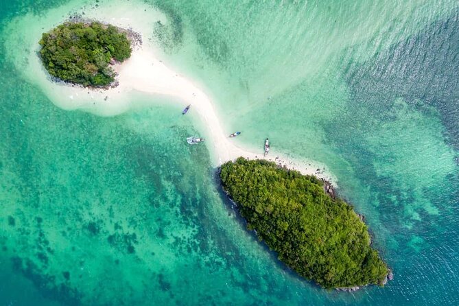 Early bird Phi Phi islands and 4 Islands by Speedboat Tour - Early-bird timing: beating the day at Maya Bay and Pileh Lagoon
