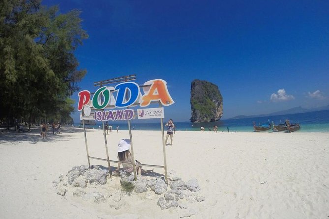 Krabi 4 Island Tour: Private Long-tail Boat Charter - Phra Nang Cave area: stalactites, offerings, and cliff views