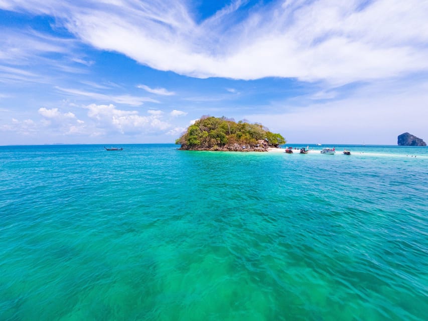 Krabi: 4 Island Whirlwind Tour with Caves, Sandbars & Reefs - Railay Beach and Phra Nang Cave Beach: cliffs, shrine, and a calm hour by the water