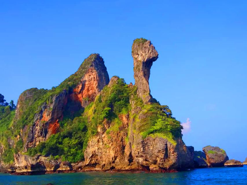 Krabi: 4 Islands Sunset Longtail Boat Tour with BBQ Dinner - Railay to Phra Nang: Limestone Views and Reef Snorkeling