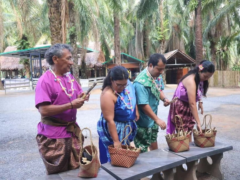 Krabi: Elephant Feeding Program with Traditional Thai Dress - One Basket, Two Treat Options, and a Clear Feeding Routine