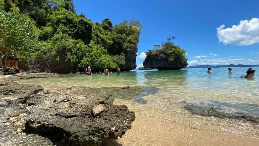 Krabi: Hong Islands Full-Day Private Speedboat Charter Tour - Hong Island: swimming, snorkeling, kayaking, and lunch under the trees