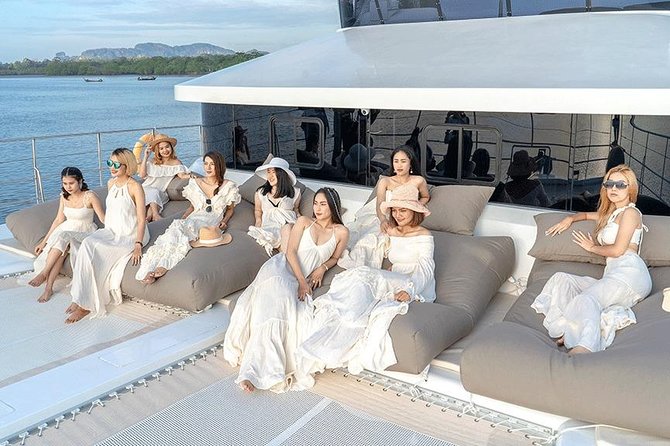 Krabi Hong Islands Sunset Party Catamaran Cruise - The short beach-and-cliff pause: relax, photo, and reset