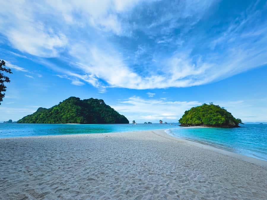 Krabi: Luxury Boat 7 Island Sunset With BBQ & Plankton Tour - Chicken Island: Snorkeling Over Coral Reefs and a Rock Shaped Like a Chicken