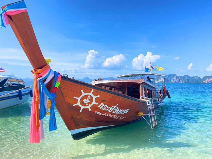 Krabi: Luxury Boat 7 Island Sunset With BBQ & Plankton Tour - Phra Nang Cave and Phra Nang Beach: Limestone Shapes and a Sacred Shrine