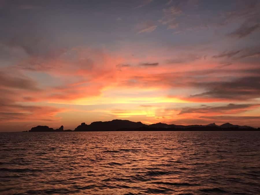 Krabi: Luxury Sunset Cruise to 4 Islands by Power Catamaran - Getting On Board: Pickup and the Krabi River Warm-Up