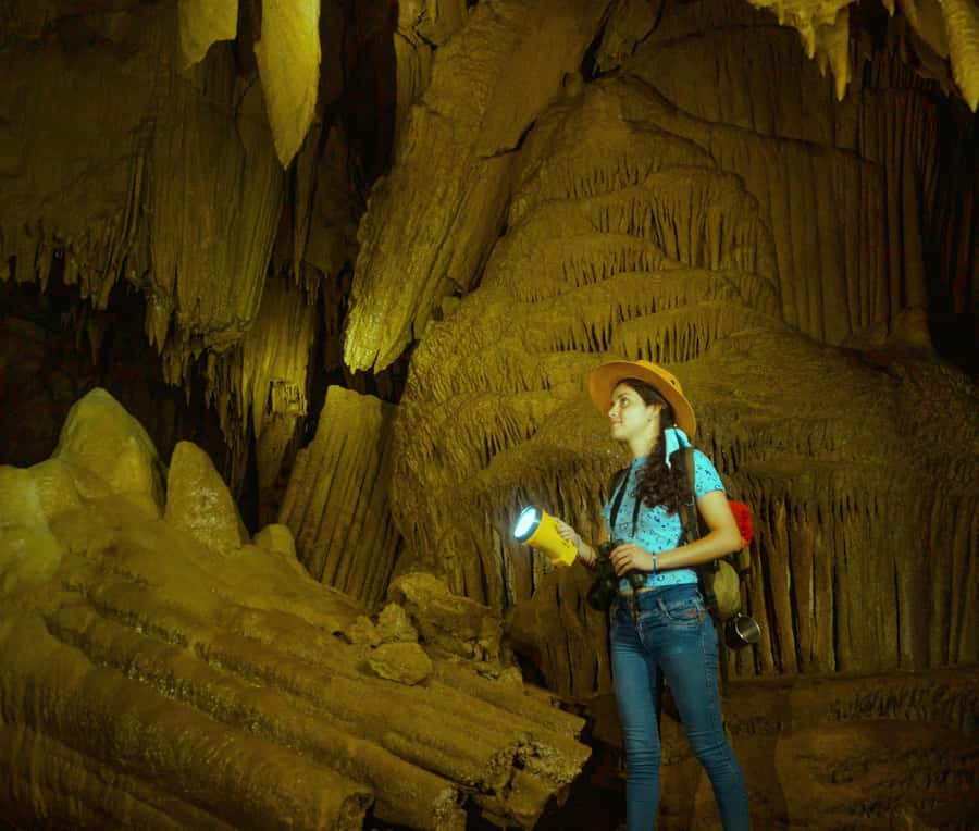 Krabi: Mangroves and Khao Kanab Nam Cave Tour with Lunch - Entering Khao Khanab Nam Cave: stalactites, stalagmites, and a story you should question
