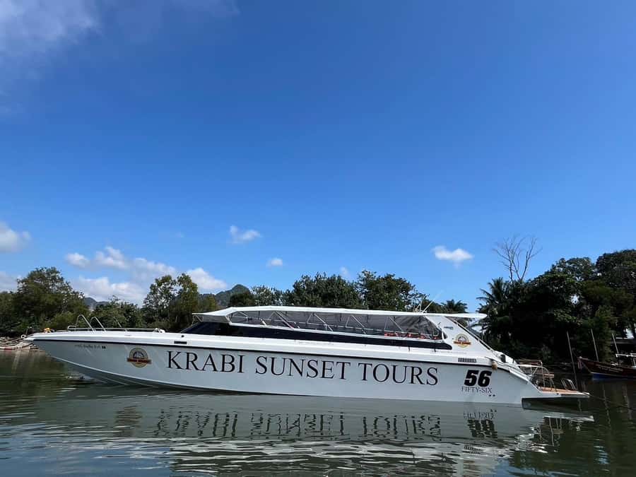 Krabi: Phi Phi Island Sunset Maya Bay and Four Islands Tour - On the water: a modern fiberglass speedboat and a capped group size