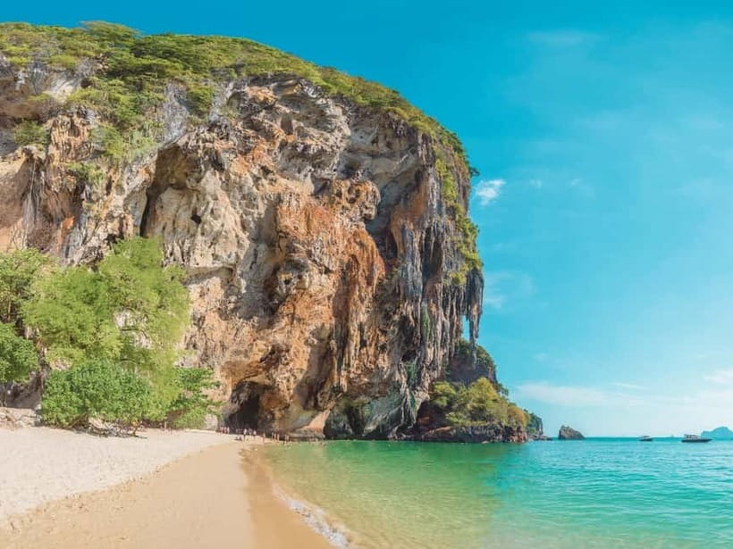 Krabi: Railay Phra Nang & Diamond Cave Sunset Plankton Tour - Getting to Railay: that first boat ride through limestone scenery