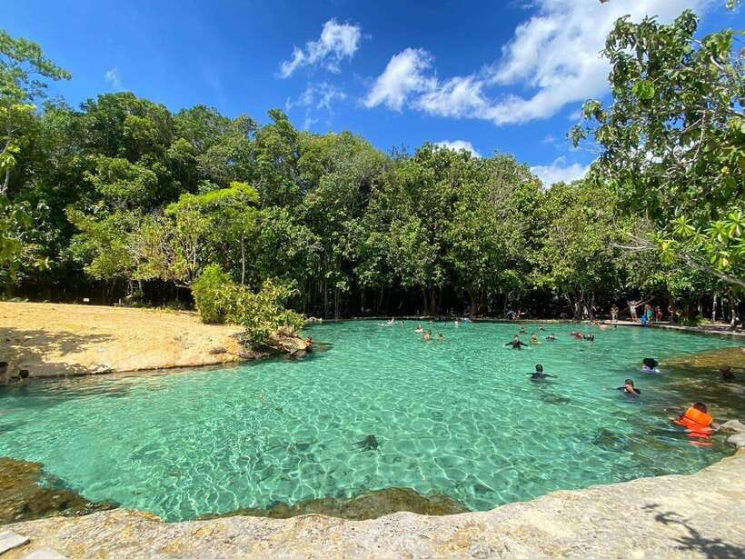 Krabi: Tiger Cave Temple, Emerald Pool and Hot Springs Tour - Hot Springs Waterfall: the warm-water reset after pool-to-pool walking