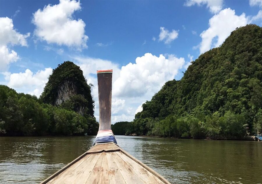 Krabi: Twin Mountains & Koh Klang Local Community Tour - Getting to the mangroves: Krabi River statues, then longtail boat reality