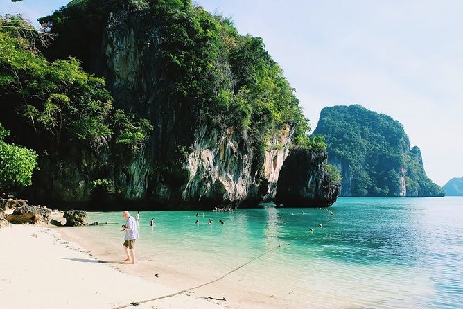 Longtail Boat Private Charter Tour to Hong Islands From Krabi - Stop-by-stop: Ko Lao La Ding (Lading Island) for beach breaks