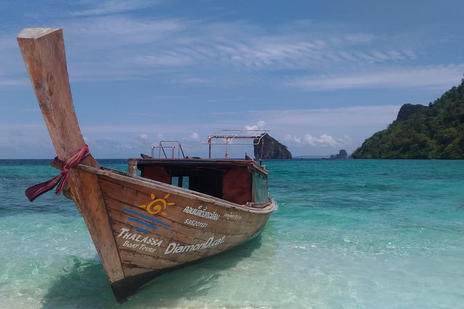 Railay and 4-Island Sunset Speedboat Cruise with Night Snorkel - Food, drinks, and onboard briefings (including fish ID)