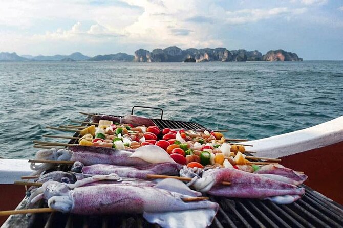 Sunset Dinner Cruise with night Swimming by Luxury Junk Boat - Dinner on board: BBQ seafood, Thai sides, and mango sticky rice