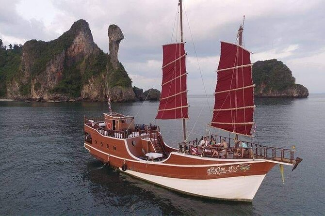 Sunset Dinner Cruise with night Swimming by Luxury Junk Boat - Poda Island swim and snorkel: your first big water stop